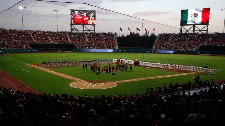 A view of the inauguration ceremony at the Alfredo Harp Helu Stadium, the new home of Los Diablos Rojos baseball team, in Mexico City, Saturday, March 23, 2019. (AP Photo/Marco Ugarte)