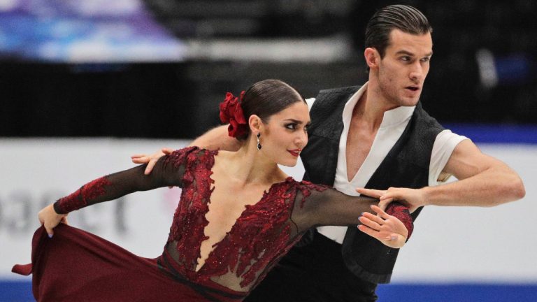 Canada's Laurence Fournier Beaudry and Nikolaj Sorensen perform their ice dance free dance during the ISU World Figure Skating Championships at Saitama Super Arena in Saitama, north of Tokyo, Saturday, March 23, 2019. (Andy Wong/AP)