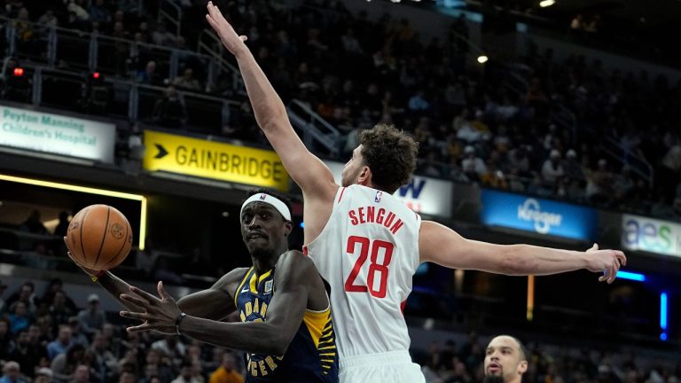 Indiana Pacers' Pascal Siakam (43) puts up a shot against Houston Rockets' Alperen Sengun (28) during the first half of an NBA basketball game, Tuesday, Feb. 6, 2024, in Indianapolis. (Darron Cummings/AP)