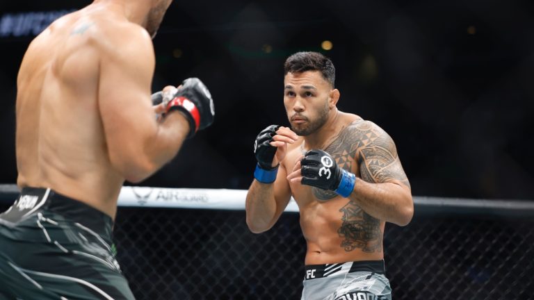 Brad Tavares in action during a UFC 292 mixed martial arts fight in Boston. (Gregory Payan/AP)
