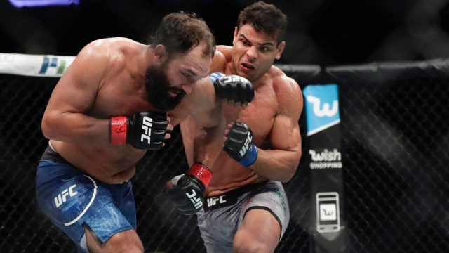 Paulo-Costa-punches-Johny-Hendricks-during-a-middleweight-mixed-martial-arts-bout-at-UFC-217