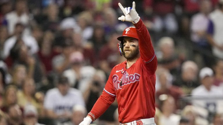 FILE - Philadelphia Phillies' Bryce Harper celebrates a home run against the Arizona Diamondbacks during the sixth inning in Game 5 of the baseball NL Championship Series in Phoenix, Saturday, Oct. 21, 2023. Harper said Sunday, Feb. 18, 2024, that he wants to finish his career with the Philadelphia Phillies, playing into his 40s. (Brynn Anderson/AP)