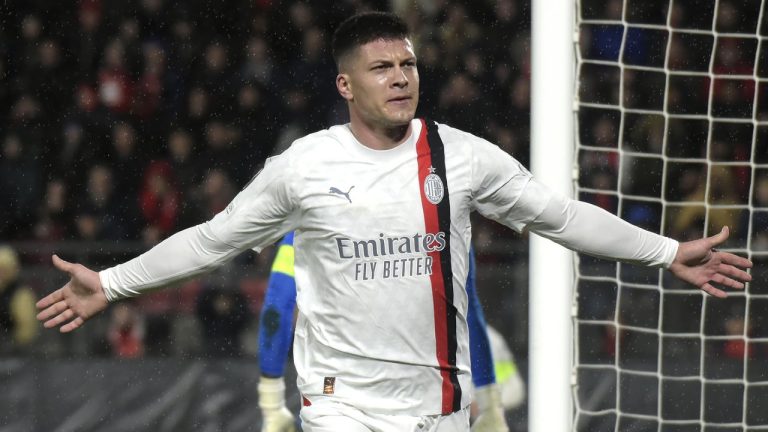 AC Milan's Luka Jovic celebrates after scoring during the Europa League soccer match between Rennes and AC Milan at the Roazhon Park stadium in Rennes, western France, Thursday, Feb. 22, 2024. (Mathieu Pattier/AP)