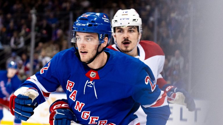 New York Rangers centre Jonny Brodzinski, front, is held by Montreal Canadiens defenseman Arber Xhekaj, rear, in the first period of an NHL hockey game Thursday, Feb. 15, 2024, in New York. (Peter K. Afriyie/AP Photo)
