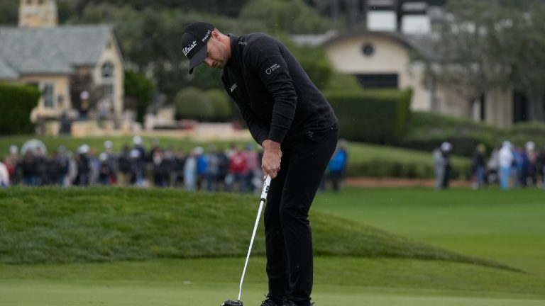 Wyndham Clark putts on the 18th green at Pebble Beach Golf Links during the third round of the AT&T Pebble Beach National Pro-Am golf tournament in Pebble Beach, Calif., Saturday, Feb. 3, 2024. (Ryan Sun/AP)