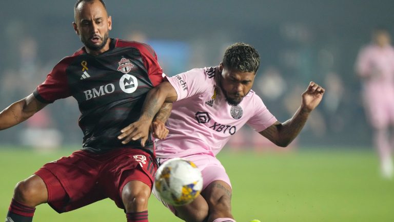 Inter Miami forward Josef Martinez, right, passes past Toronto FC midfielder Victor Vazquez during the first half of an MLS soccer match, Wednesday, Sept. 20, 2023, in Fort Lauderdale, Fla. (Wilfredo Lee/AP)
