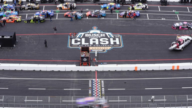 A car drives during qualifying for the NASCAR Mexico Series auto race at Los Angeles Memorial Coliseum Saturday, Feb. 3, 2024, in Los Angeles. (Mark J. Terrill/AP)