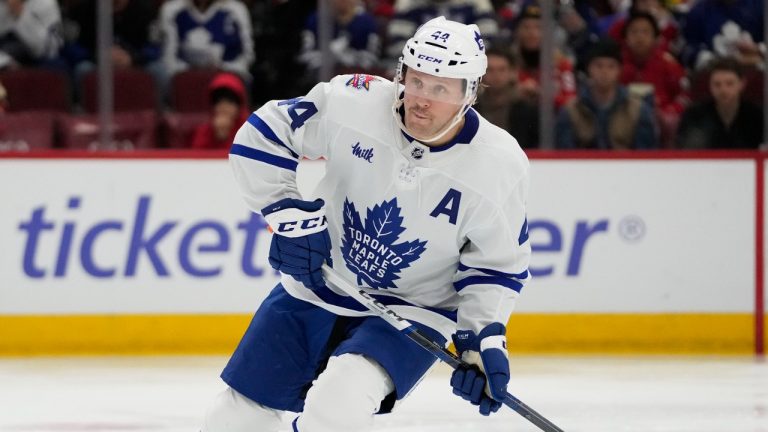 Toronto Maple Leafs defenceman Morgan Rielly handles the puck during the second period of an NHL hockey game against the Chicago Blackhawks Friday, Nov. 24, 2023, in Chicago. (Erin Hooley/AP)