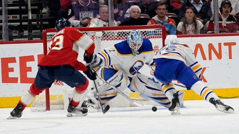 Buffalo Sabres goaltender Ukko-Pekka Luukkonen (1) defends against Florida Panthers center Carter Verhaeghe (23) during the first period of an NHL hockey game Tuesday, Feb. 27, 2024, in Sunrise, Fla. (Lynne Sladky/AP Photo)