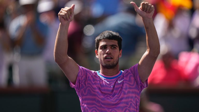 Carlos Alcaraz, of Spain, celebrates after defeating Fabian Marozsan, of Hungary, at the BNP Paribas Open tennis tournament Tuesday, March 12, 2024, in Indian Wells, Calif. (Mark J. Terrill/AP)