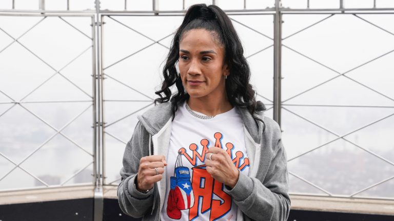 Boxer Amanda Serrano poses for a picture on the observation deck of the Empire State Building in New York, Tuesday, April 26, 2022. (Seth Wenig/AP)