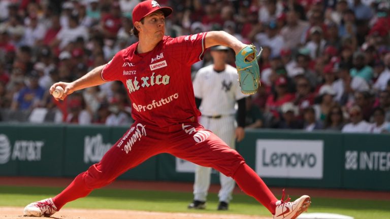 Diablos Rojos' pitcher Trevor Bauer throws against New York Yankees' Anthony Volpe during the first inning of a baseball exhibition game at Alfredo Harp Helu Stadium in Mexico City, Sunday, March 24, 2024. (Fernando Llano/AP)