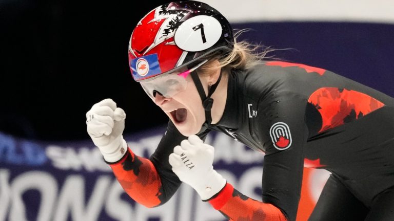 Canada's Kim Boutin celebrates winning the gold medal in the women's 500 meters final during the World Championships Short Track skating at Ahoy Arena in Rotterdam, Netherlands, Saturday, March 16, 2024. (Peter Dejong/AP)