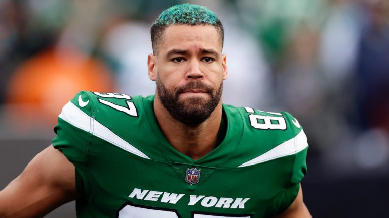 New York Jets tight end C.J. Uzomah (87) reacts while being introduced before an NFL football game against the Philadelphia Eagles on Sunday, Oct. 15, 2023, in East Rutherford, N.J. (Adam Hunger/AP)