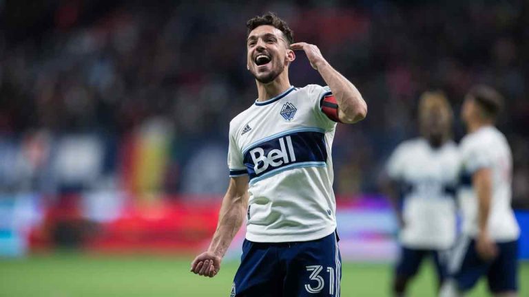 Vancouver Whitecaps' Russell Teibert celebrates after Vancouver qualified for the playoffs after a 1-1 draw with the Seattle Sounders during an MLS soccer game in Vancouver, B.C., Sunday, Nov. 7, 2021. (Darryl Dyck/CP)
