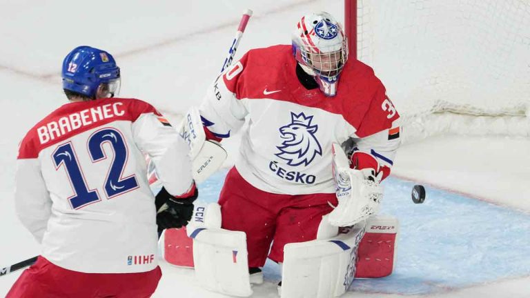 Czechia’s goaltender Tomas Suchanek, right, makes a save in front of teammate Jakub Brabenec during second period IIHF World Junior Hockey Championship action against Sweden in Halifax, Thursday, Dec. 29, 2022. (Darren Calabrese/CP)