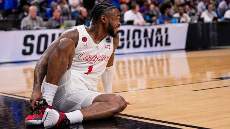 Houston's Jamal Shead reacts after going down while driving to the basket against Duke during the first half of a Sweet 16 college basketball game in the NCAA Tournament in Dallas, Friday, March 29, 2024. (Tony Gutierrez/AP)