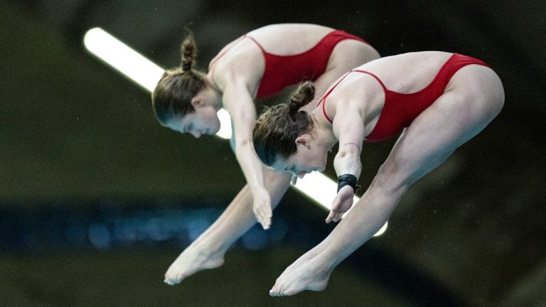 Kate Miller and Caeli McKay of Canada compete during the women's 10m synchronized platform final at the World Aquatics Diving World Cup 2024 in Montreal, Saturday, Mar. 2, 2024. THE CANADIAN PRESS/Christinne Muschi