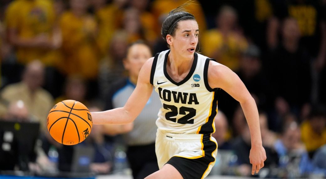 Clark scores 32, top seed Iowa survives to beat West Virginia