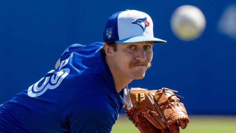 Toronto Blue Jays starting pitcher Chad Dallas throws a warmup pitch at the start of opening day Spring Training action against the Philadelphia Phillies. (Frank Gunn/CP)