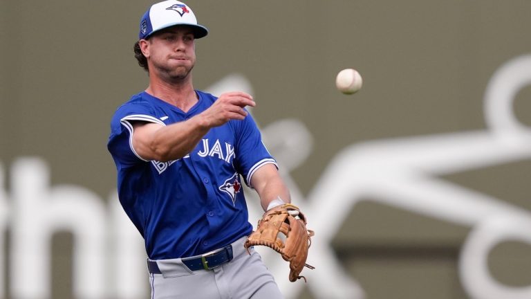 Toronto Blue Jays second baseman Ernie Clement throws for a force out on a hit by Boston Red Sox Enmanuel Valdez in the third inning of a spring training baseball game in Fort Myers, Fla., Sunday, March 3, 2024. (Gerald Herbert/AP)