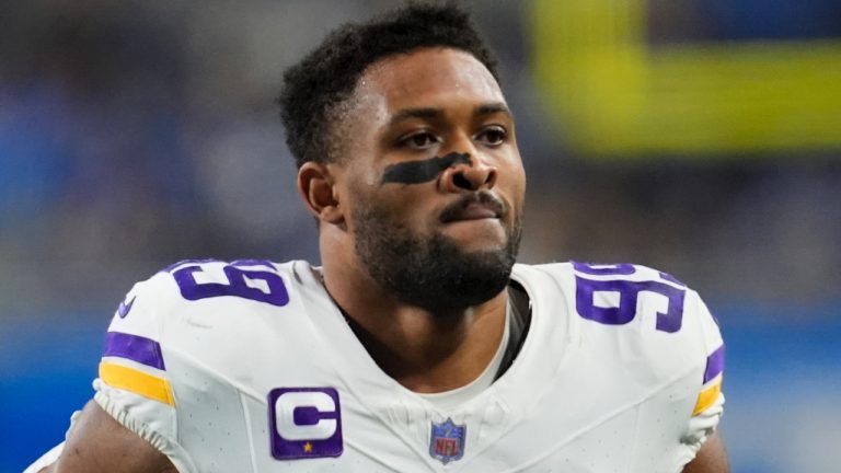 Danielle Hunter (99) walks on the field before an NFL football game against the Detroit Lions in Detroit, Sunday, Jan. 7, 2024. (Paul Sancya/AP)