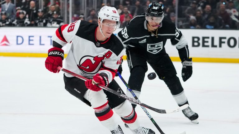 New Jersey Devils left wing Ondrej Palat and Los Angeles Kings right wing Quinton Byfield vie for the puck during the first period of an NHL hockey game, Sunday, March 3, 2024, in Los Angeles. (Ryan Sun/AP Photo)