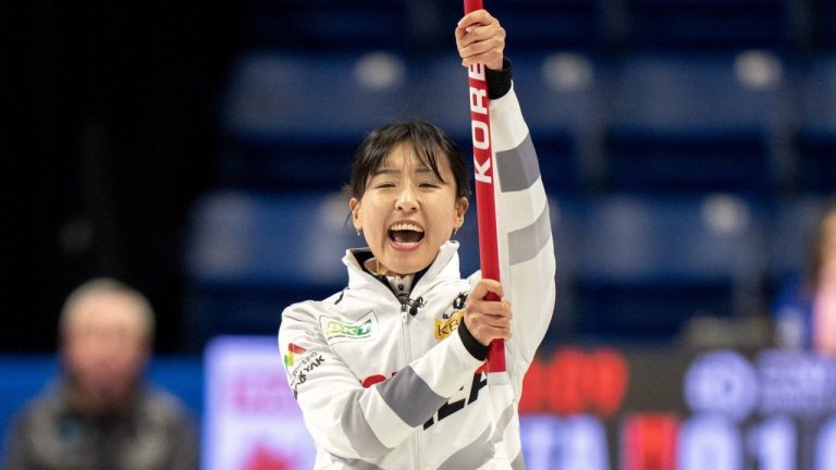 Korea skip Eunji Gim celebrates her win over Italy in World Women's Curling Championship bronze medal action in Sydney, N.S. on Sunday, March 24, 2024. (CP/Frank Gunn)