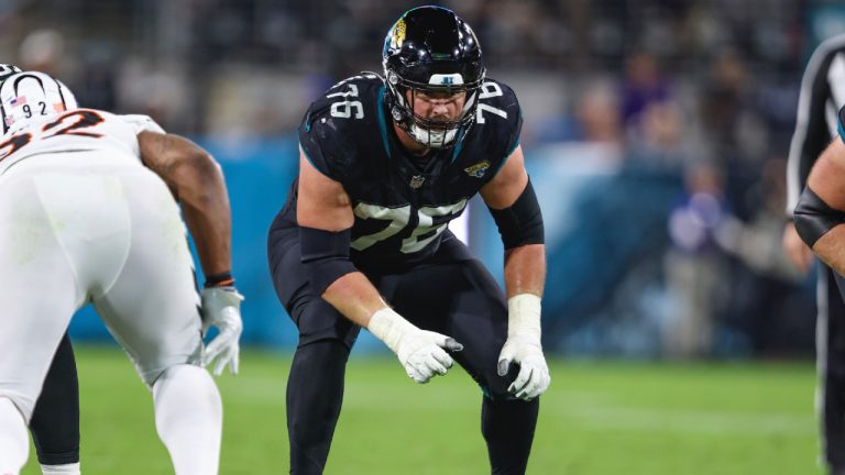 Jacksonville Jaguars guard Ezra Cleveland (76) in action during an NFL football game against the Cincinnati Bengals, Monday, Dec. 4, 2023, in Jacksonville, Fla. (Gary McCullough/AP)
