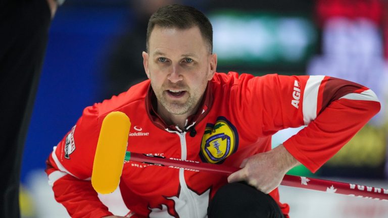 Team Canada skip Brad Gushue watches his shot while playing Team Manitoba-Carruthers during the playoffs at the Brier. (Darryl Dyck/CP)