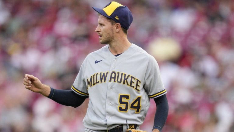 Milwaukee Brewers relief pitcher Jake Cousins looks on during a baseball game against the Cincinnati Reds in Cincinnati, June 3, 2023. Cousins was acquired by the New York Yankees from the Chicago White Sox on Sunday, March 31, 2024, for cash. (AP Photo/Jeff Dean, File)