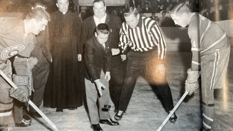 Quebec City police say they've made an arrest in the theft of a signed Jean Béliveau photo, shown in a handout, from the Quebec International Peewee Hockey Tournament, but the photo has not been recovered. (THE CANADIAN PRESS/HO-SPVQ)