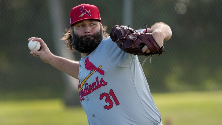 St. Louis Cardinals pitcher Lance Lynn throws during a spring training baseball workout. (Jeff Roberson/AP)