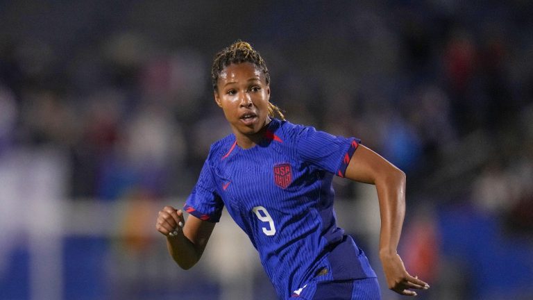 United States women's national team forward Midge Purce sustained a season-ending knee injury this past weekend. (AP/Julio Cortez)