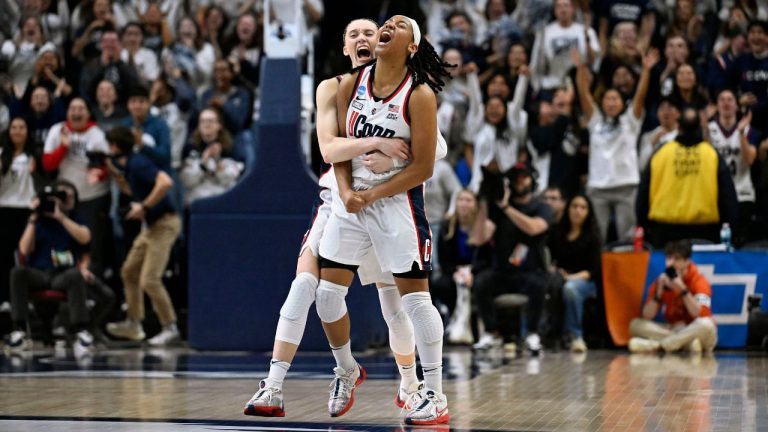 UConn guard Paige Bueckers celebrates with teammate KK Arnold in the second half of a second-round college basketball game in the NCAA Tournament against Syracuse, Monday, March 25, 2024, in Storrs, Conn. (Jessica Hill/AP Photo)