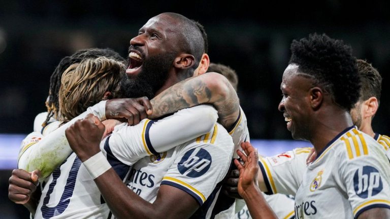Real Madrid's Antonio Rudiger celebrates with teammates after scoring his side's second goal the Spanish La Liga soccer match between Real Madrid and Celta Vigo at the Santiago Bernabeu stadium in Madrid, Spain, Sunday, March 10, 2024. (Manu Fernandez/AP Photo)
