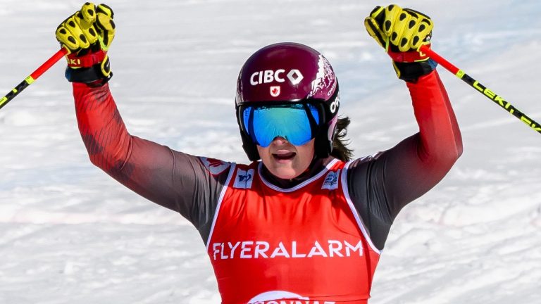 Marielle Thompson of Canada celebrates after winning the women's Ski Cross event at the FIS Ski Cross, SX, World Cup in Veysonnaz, Switzerland, Saturday, March 16, 2024. (Jean-Christophe Bott/Keystone via AP)