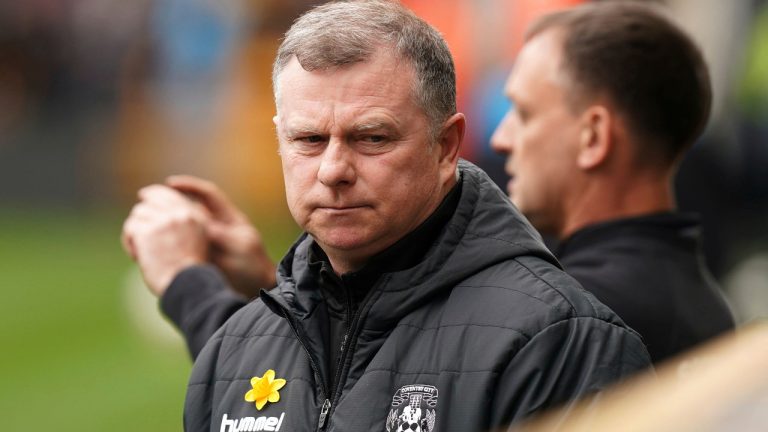 Coventry City manager Mark Robins looks on before the English FA Cup quarterfinal match soccer match between Wolverhampton and Coventry City, at the Molineux, Wolverhampton, England, Saturday, March 16, 2024. (Mike Egerton/PA via AP)