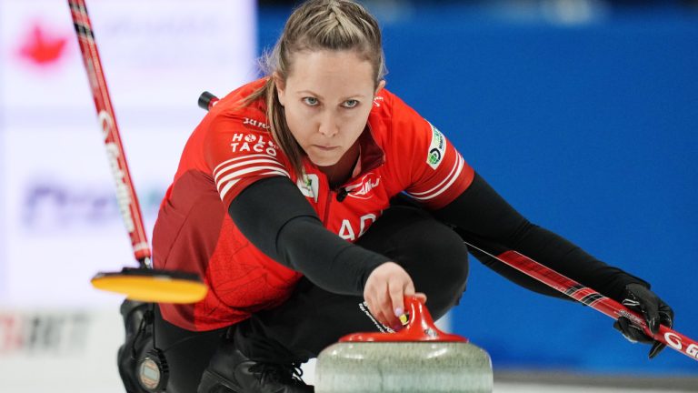 Canada's skip Rachel Homan delivers a stone during World Women’s Curling Championship action against the United States in Sydney, N.S. on Sunday, March 17, 2024. (Darren Calabrese/CP)