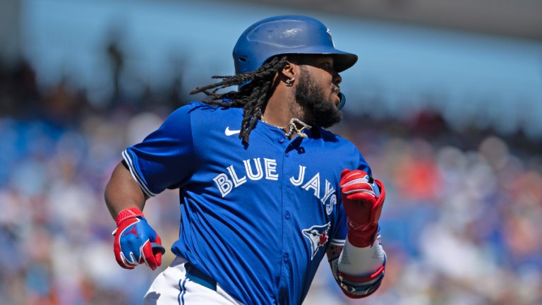 Toronto Blue Jays first baseman Vladimir Guerrero Jr. reaches base during spring training action against the Baltimore Orioles Tuesday, March 19, 2024, in Dunedin, Florida. (Mark Taylor/CP)
