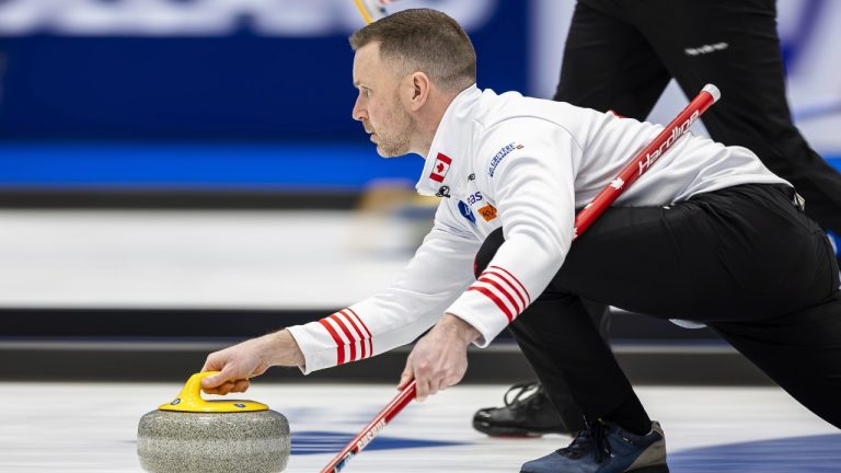 Canada's skip Brad Gushue delivers a stone against the Czech Republic at the men's Curling World Championships in Schaffhausen, Switzerland, Saturday, March 30, 2024. (Michael Buholzer/Keystone via AP)