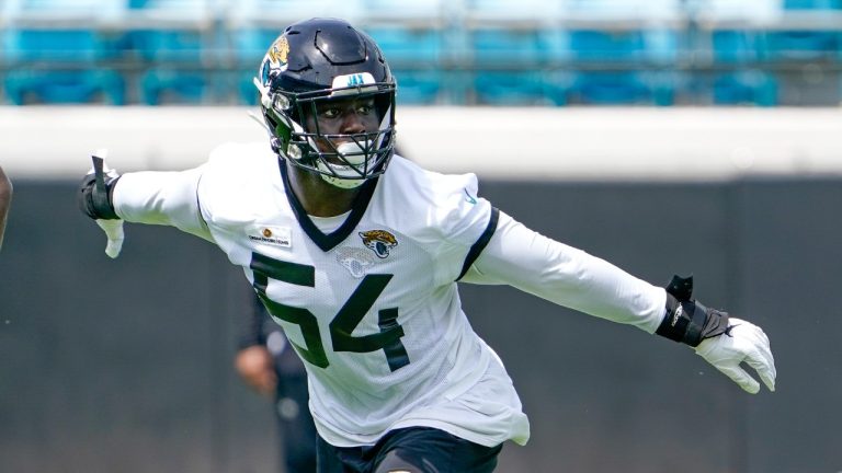 Jacksonville Jaguars inside linebacker Foye Oluokun (54) performs a drill on defense during an NFL football practice, Monday, May 23, 2022, in Jacksonville, Fla. (John Raoux/AP)