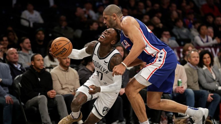 Brooklyn Nets guard Dennis Schroder (17) reacts after being fouled by Philadelphia 76ers forward Nicolas Batum during the first half of an NBA basketball game Tuesday, March 5, 2024, in New York. (Adam Hunger/AP Photo)
