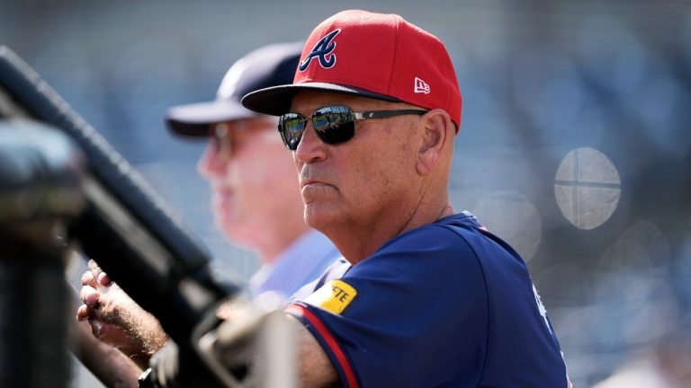 Atlanta Braves manager Brian Snitker watches batting practice before a spring training baseball game against the New York Yankees Sunday, March 10, 2024, in Tampa, Fla. (Charlie Neibergall/AP)
