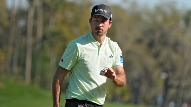 Nick Taylor, of Canada, reacts after making a birdie putt on the 14th hole during the first round of The Players Championship golf tournament Thursday, March 14, 2024, in Ponte Vedra Beach, Fla. (Lynne Sladky/AP Photo)