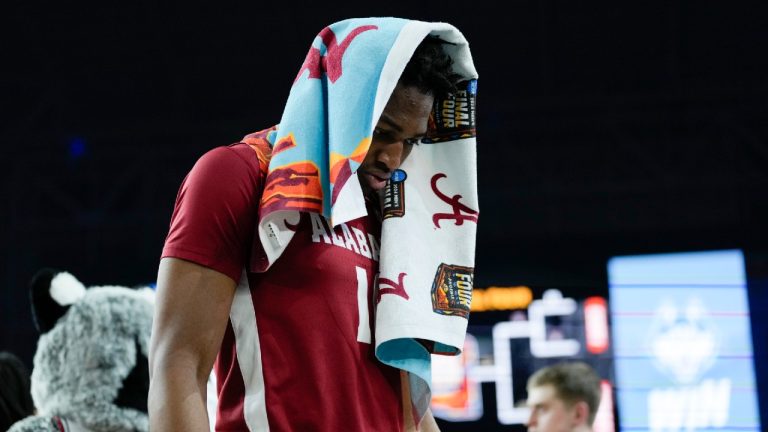 Alabama forward Mouhamed Dioubate (10) reacts after their loss against UConn in a NCAA college basketball game at the Final Four, Saturday, April 6, 2024, in Glendale, Ariz. (David J. Phillip/AP)