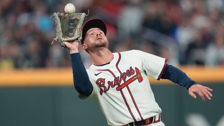 Atlanta Braves left fielder Jarred Kelenic (24) catches a fly ball to retire Arizona Diamondbacks Corbin Carroll in the eighth inning of a baseball game Saturday, April 6, 2024, in Atlanta. (John Bazemore/AP)