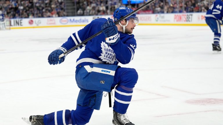 Toronto Maple Leafs centre Auston Matthews (34) takes a shot during second period NHL hockey action against the Detroit Red Wings, in Toronto, Saturday, April 13, 2024. (Frank Gunn/CP)