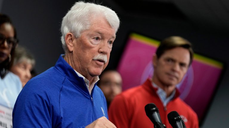 Kansas City Royals owner John Sherman, left, address the media while Kansas City Chiefs president Mark Donovan looks on during a news conference about a plan to extend a sales tax to provide funding to build a new stadium for the Royals and stadium improvement for the Chiefs Saturday, March 30, 2024, at Kauffman Stadium in Kansas City, Mo. Jackson County, Mo. residents will vote on the question Tuesday, April 2. (Charlie Riedel/AP)