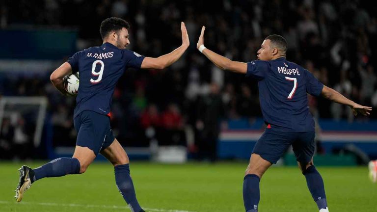 PSG's Goncalo Ramos, left, celebrates with teammate Kylian Mbappe scoring his side's first goal during the French League One soccer match between Paris Saint-Germain and Clermont at the Parc des Princes stadium in Paris, Saturday, April 6, 2024. (Lewis Joly/AP)